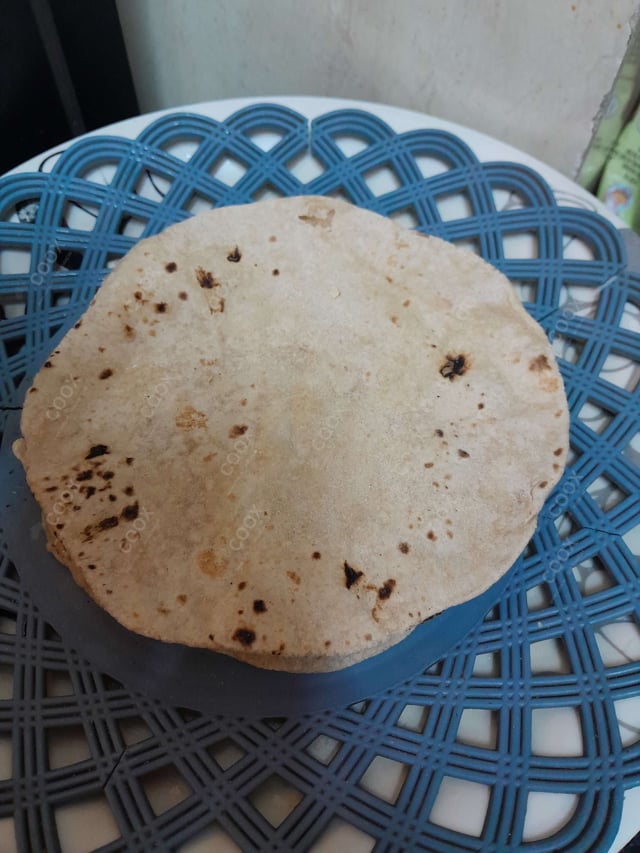 Delicious Tawa Rotis prepared by COOX