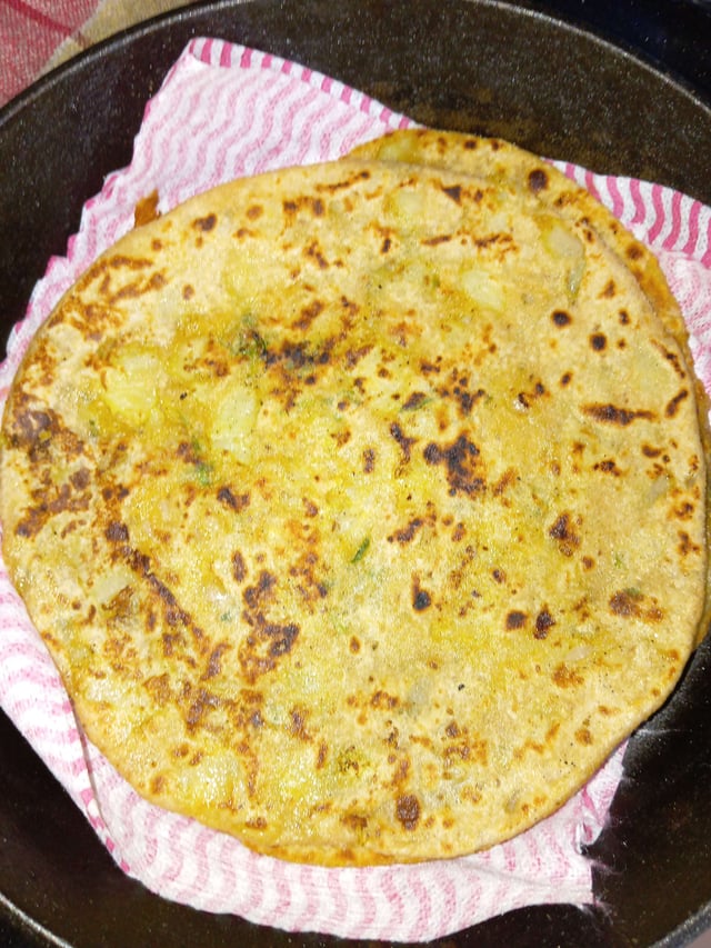 Delicious Stuffed Paranthas prepared by COOX