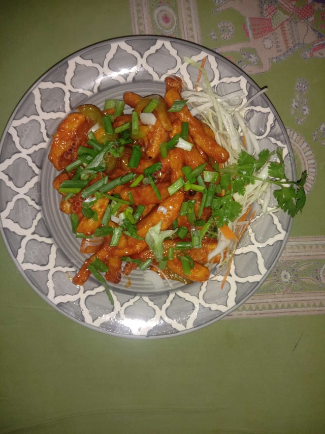 Delicious Honey Chilli Potato prepared by COOX