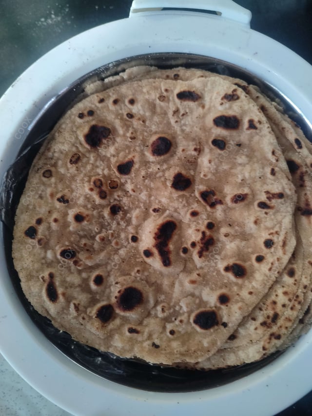 Delicious Tawa Rotis prepared by COOX