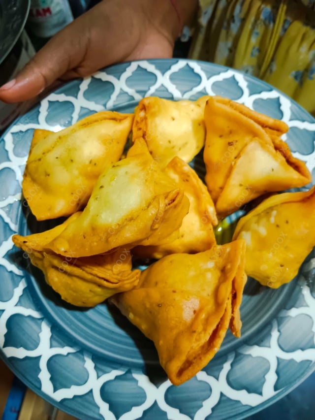 Delicious Keema Samosas prepared by COOX