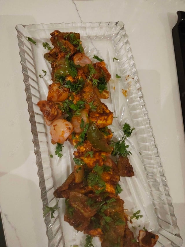 Delicious Paneer Tikka prepared by COOX