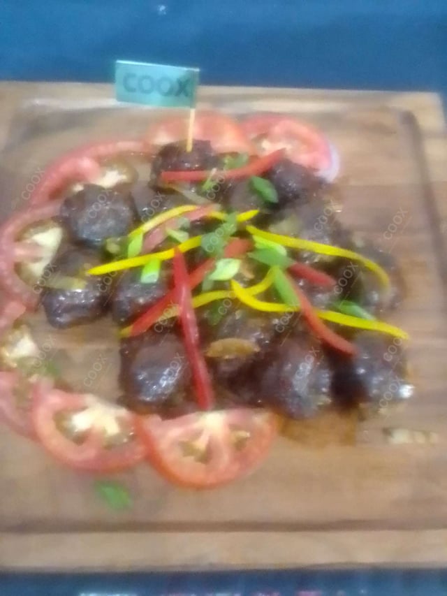 Delicious Veg Manchurian (Dry) prepared by COOX