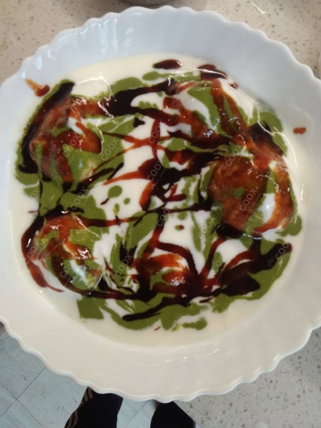 Delicious Dahi Vada prepared by COOX