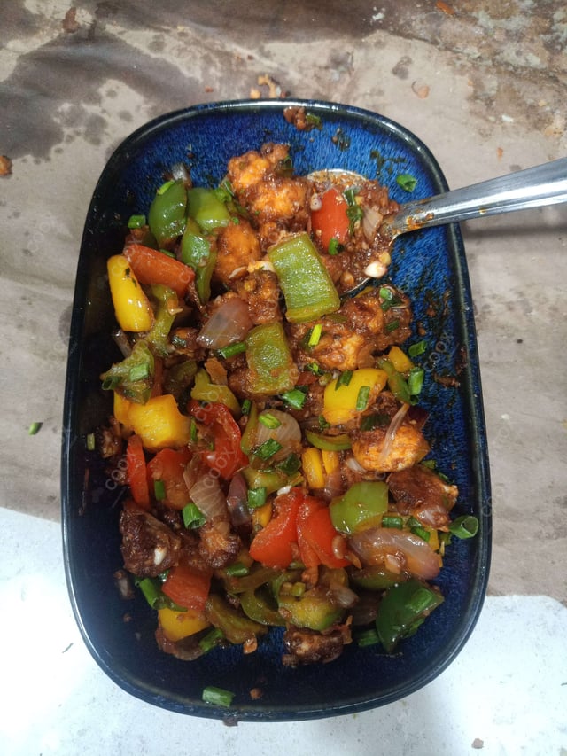 Delicious Chilli Paneer (Dry) prepared by COOX