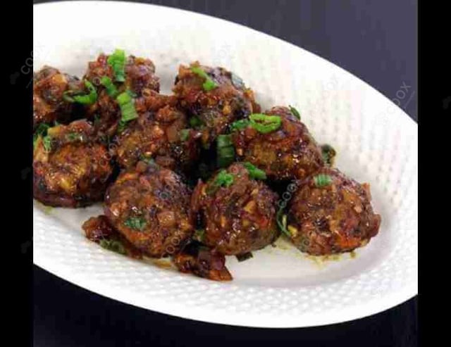 Delicious Veg Manchurian (Dry) prepared by COOX