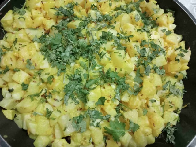 Delicious Jeera Aloo prepared by COOX