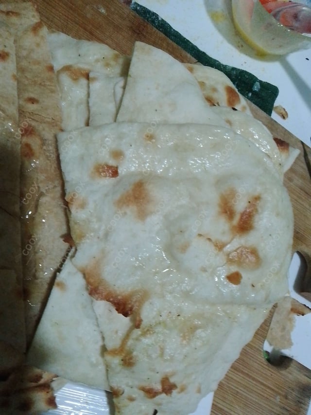 Delicious Butter Naan prepared by COOX