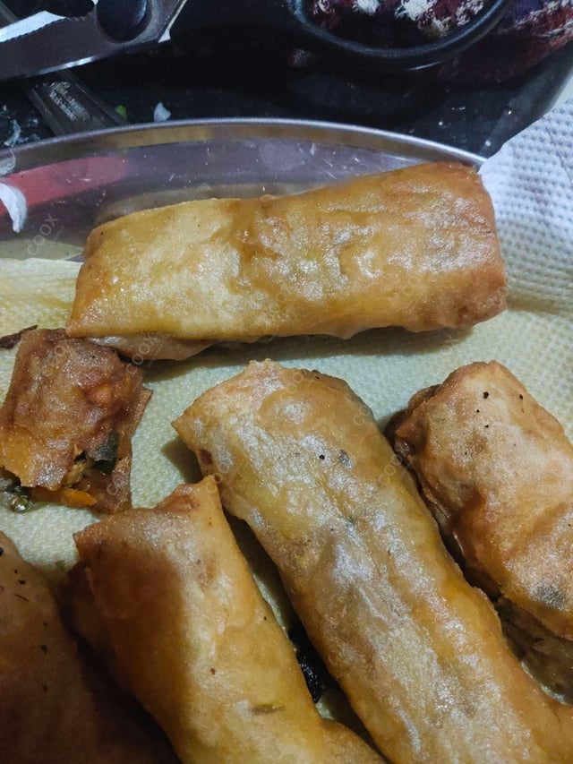 Delicious Chicken Spring Rolls prepared by COOX