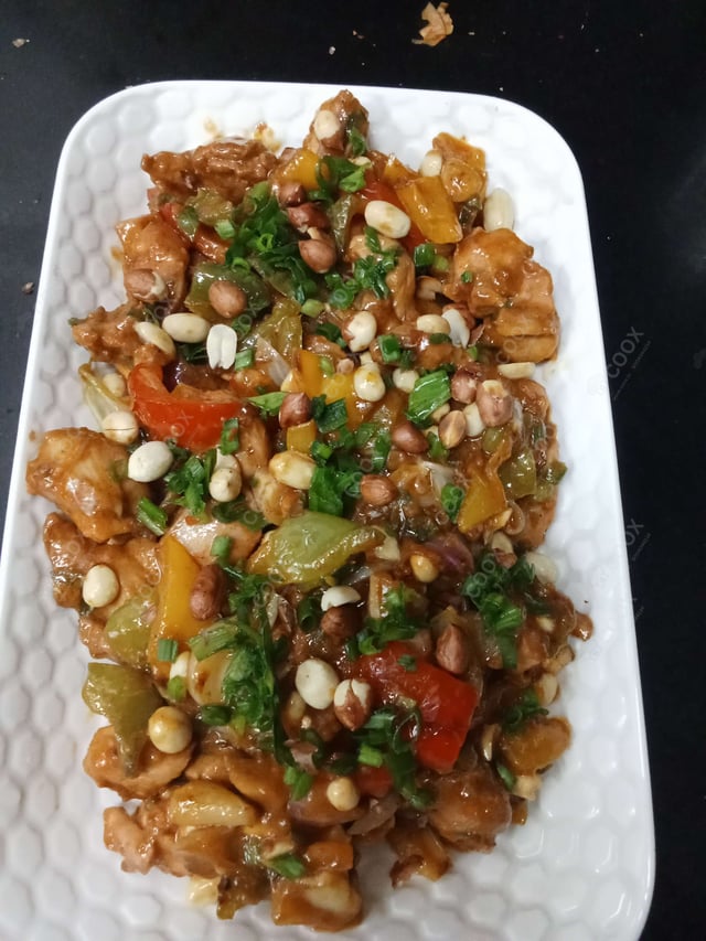 Delicious Kung Pao Chicken prepared by COOX