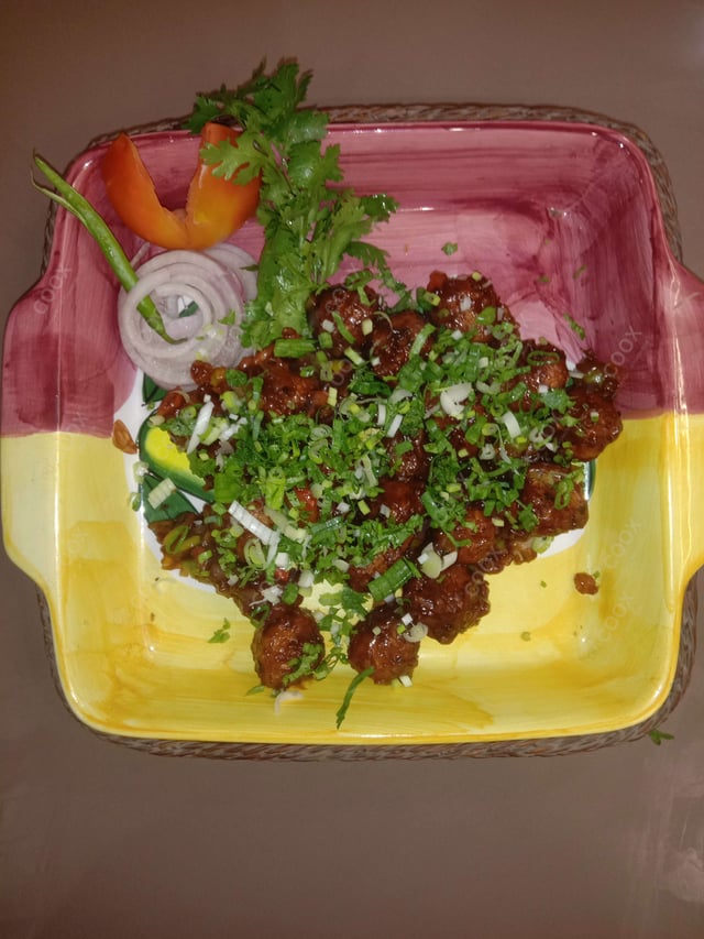 Delicious Veg Manchurian (Dry) prepared by COOX