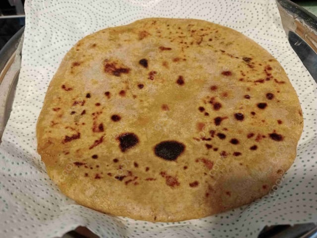 Delicious Stuffed Paranthas prepared by COOX