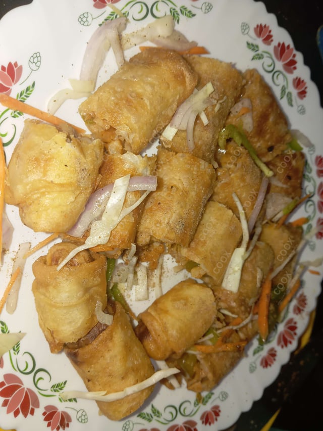 Delicious Chicken Spring Rolls prepared by COOX