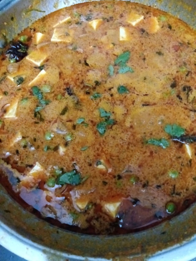 Delicious Matar Paneer prepared by COOX