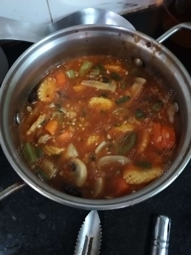 Delicious Mix Veg in Hot Garlic Sauce prepared by COOX