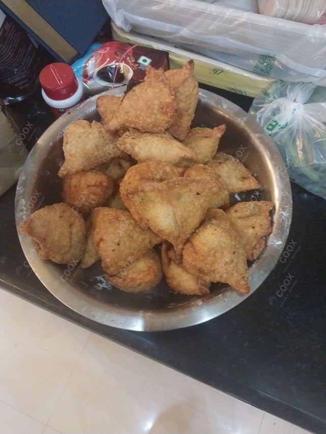 Delicious Mini Samosas prepared by COOX