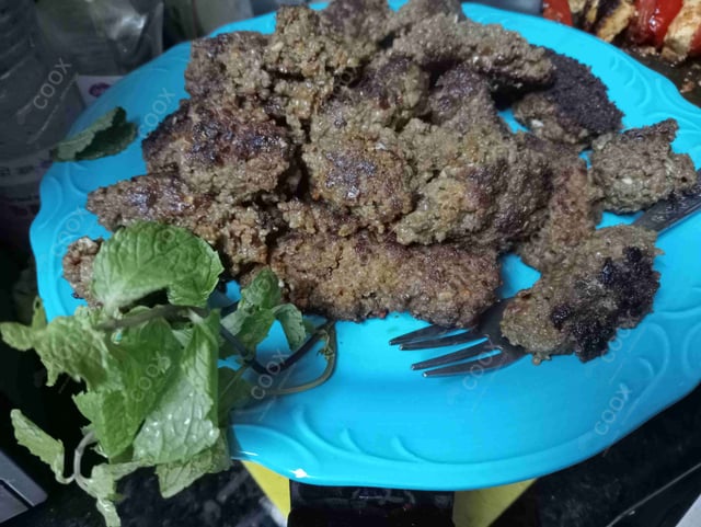 Delicious Mutton Seekh Kebab prepared by COOX