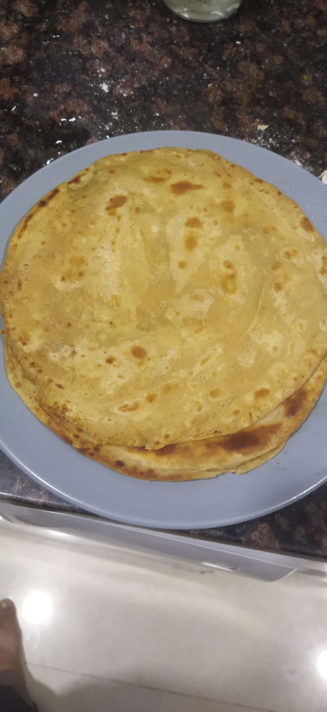 Delicious Tawa Rotis prepared by COOX