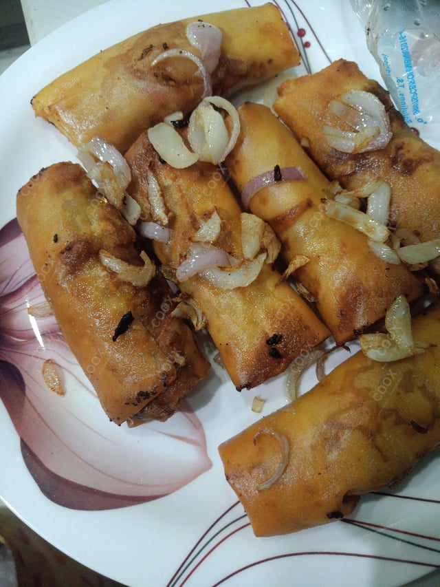 Delicious Veg Spring Rolls prepared by COOX