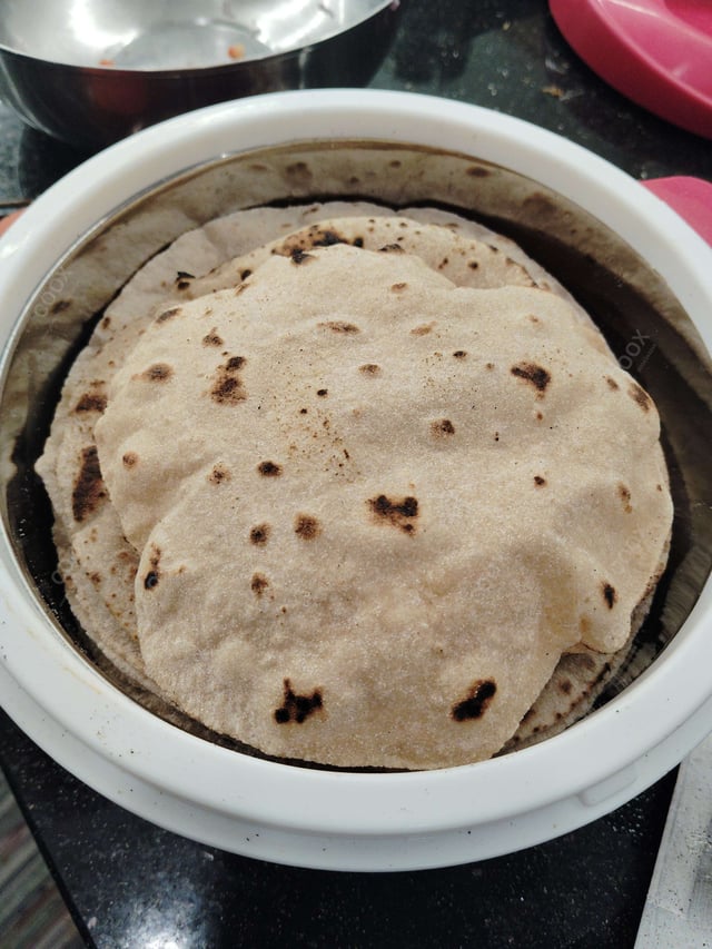 Delicious Tawa Rotis prepared by COOX