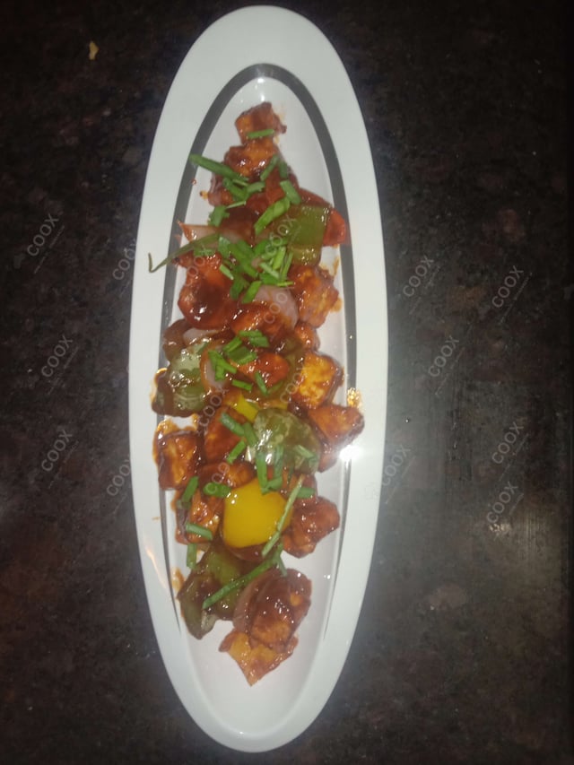 Delicious Chilli Paneer (Dry) prepared by COOX