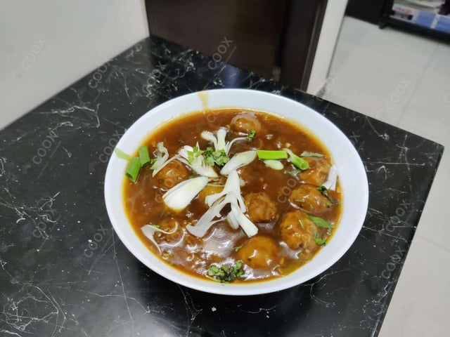 Delicious Veg Manchurian (Gravy) prepared by COOX