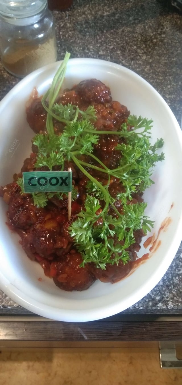 Delicious Veg Manchurian (Dry) prepared by COOX