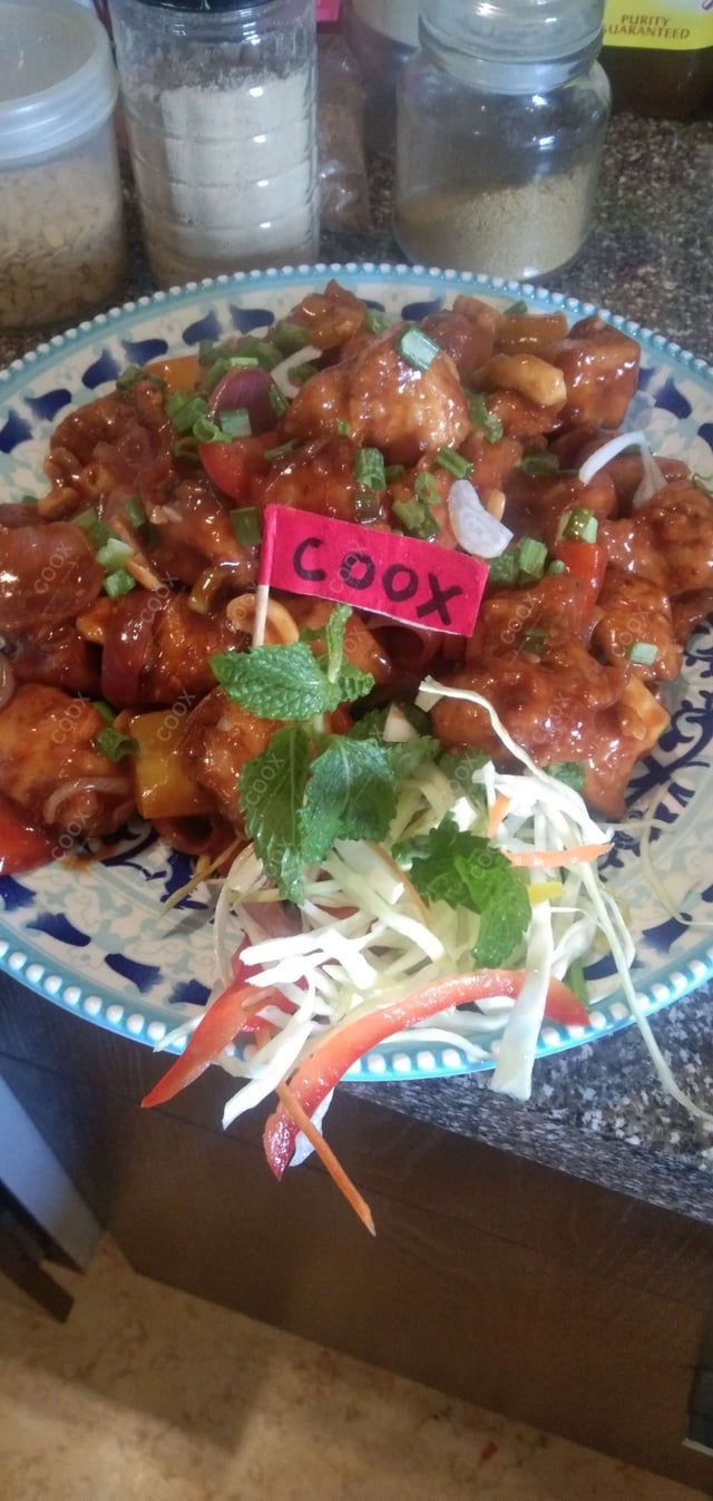 Delicious Kung Pao Chicken prepared by COOX