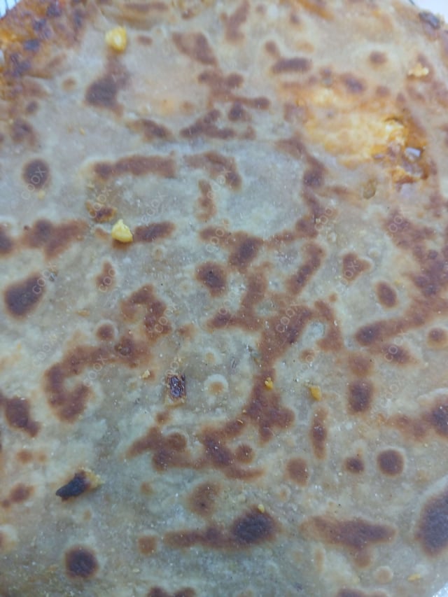 Delicious Stuffed Paranthas prepared by COOX