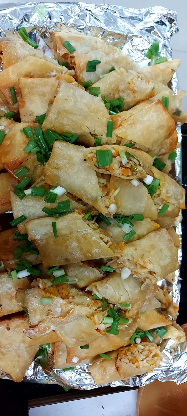 Delicious Veg Spring Rolls prepared by COOX