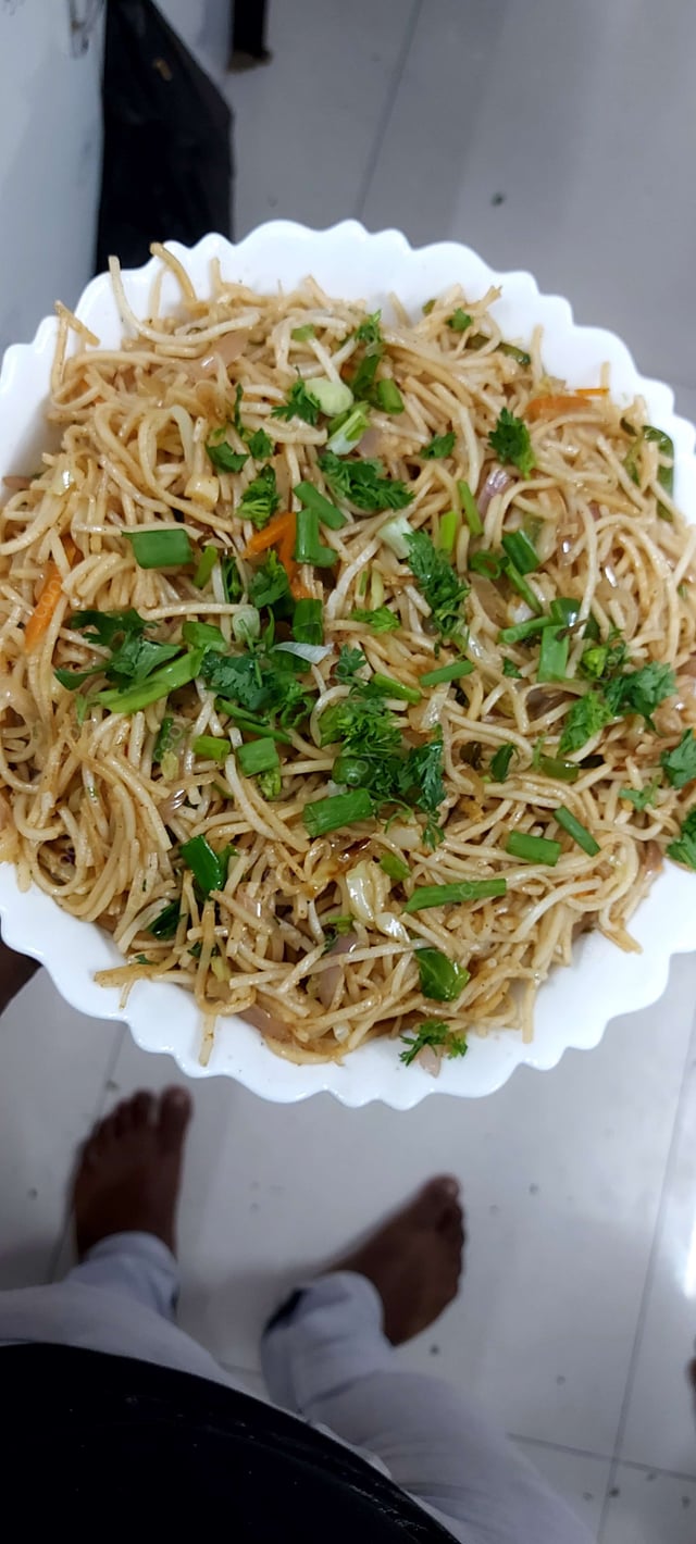 Delicious Veg Hakka Noodles prepared by COOX