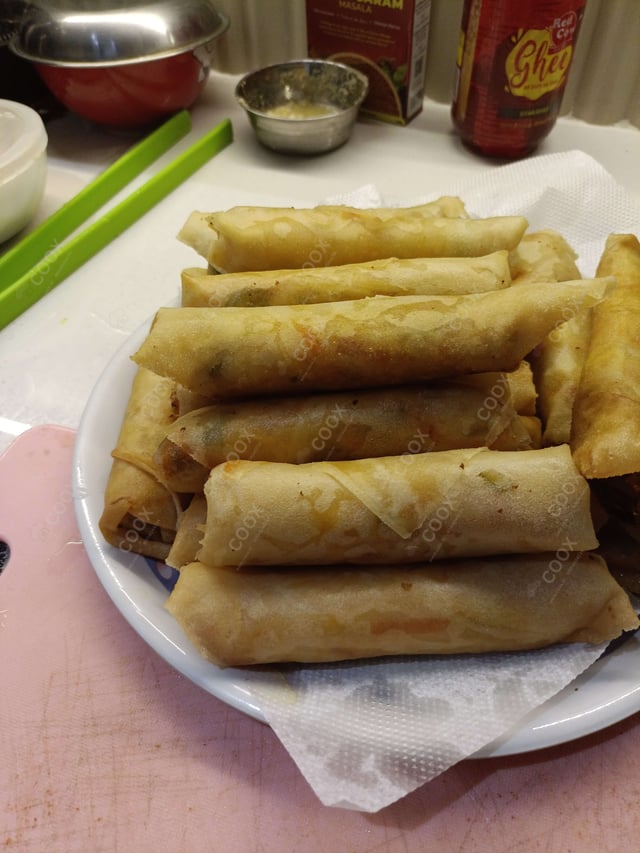 Delicious Veg Spring Rolls prepared by COOX