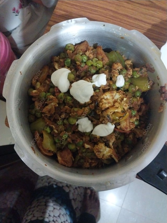 Delicious Gobhi Matar prepared by COOX