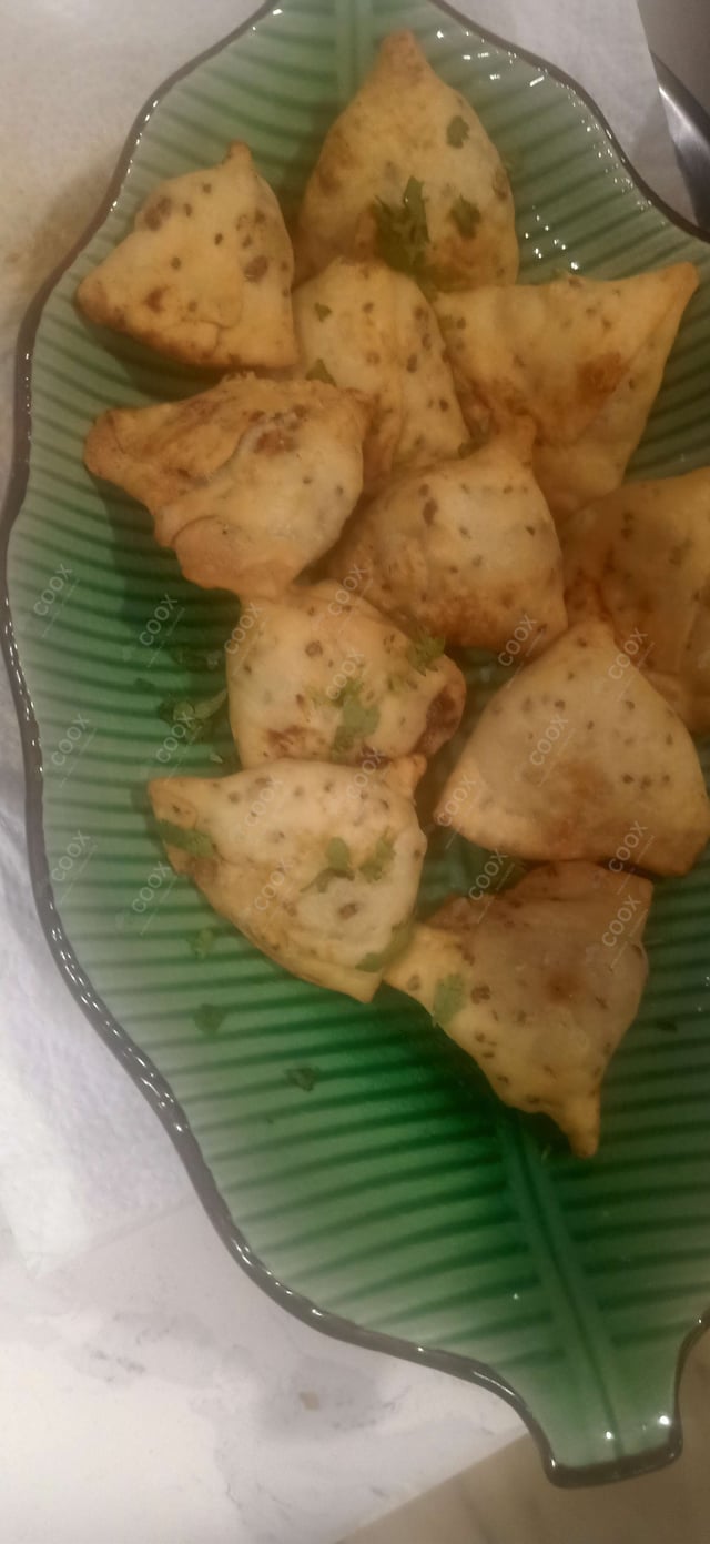 Delicious Mini Samosas prepared by COOX