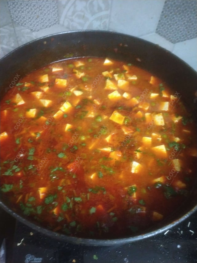 Delicious Matar Paneer prepared by COOX