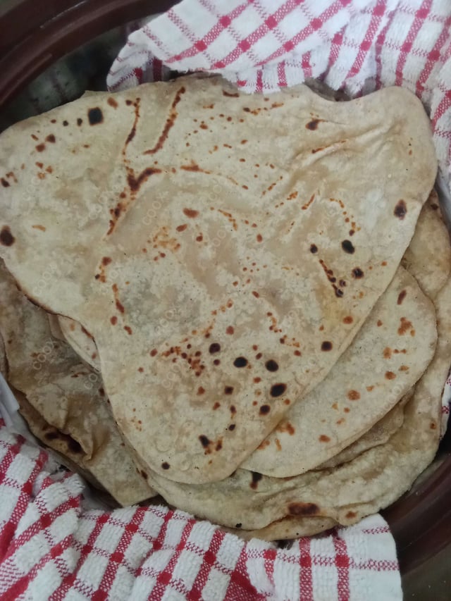 Delicious Tawa Rotis prepared by COOX