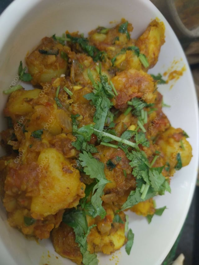 Delicious Jeera Aloo prepared by COOX