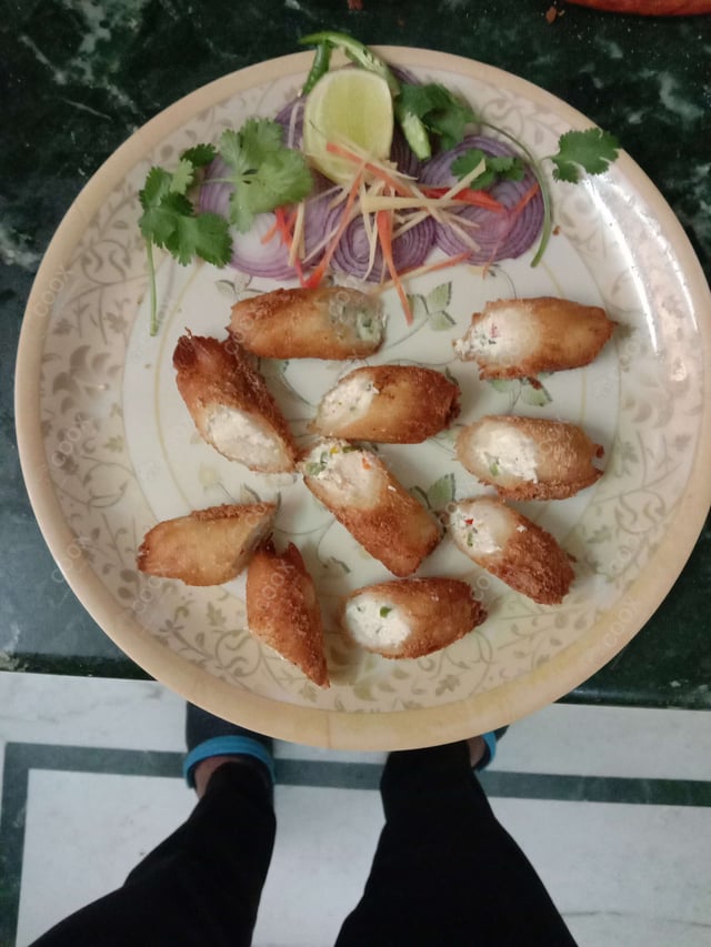 Delicious Dahi ke Sholey prepared by COOX