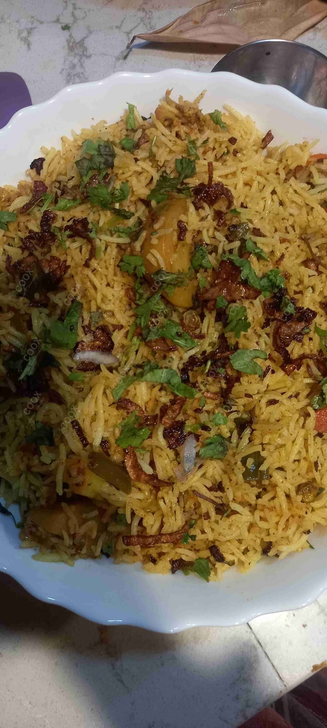 Delicious Veg Biryani prepared by COOX