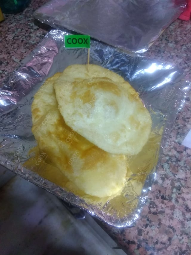 Delicious Bhature prepared by COOX