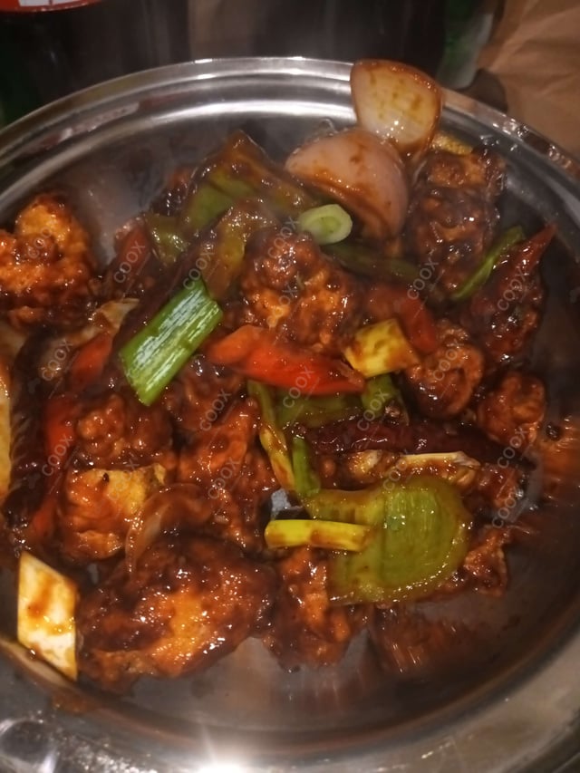 Delicious Kung Pao Chicken prepared by COOX