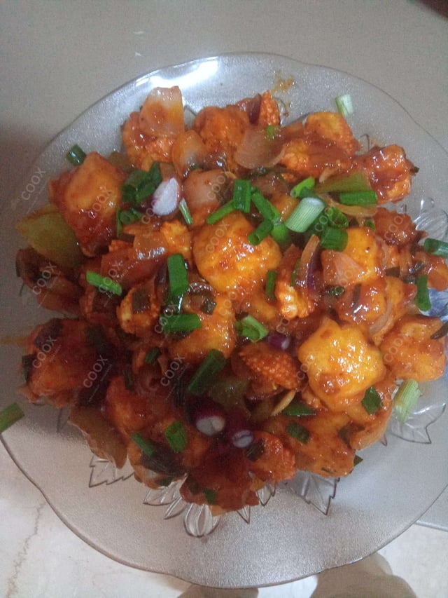 Delicious Chilli Paneer (Dry) prepared by COOX