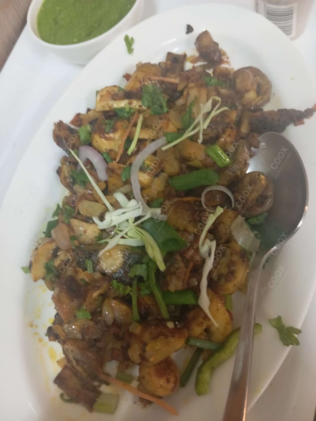 Delicious Mushroom Tikka prepared by COOX