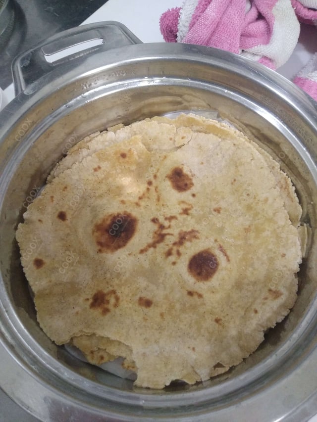 Delicious Makki ki Rotis prepared by COOX