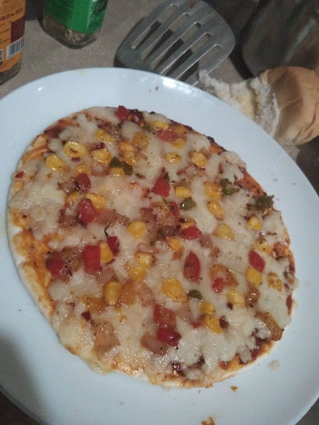 Delicious Veg Pizza prepared by COOX