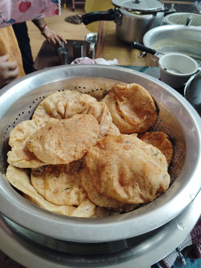 Delicious Pooris & Bedmis prepared by COOX