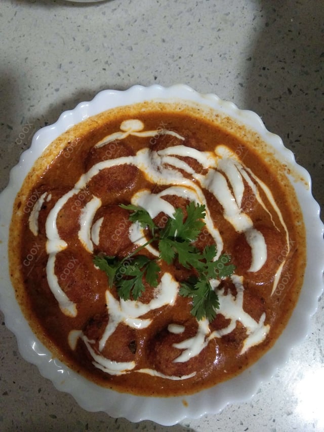 Delicious Malai Kofta (Orange Gravy) prepared by COOX