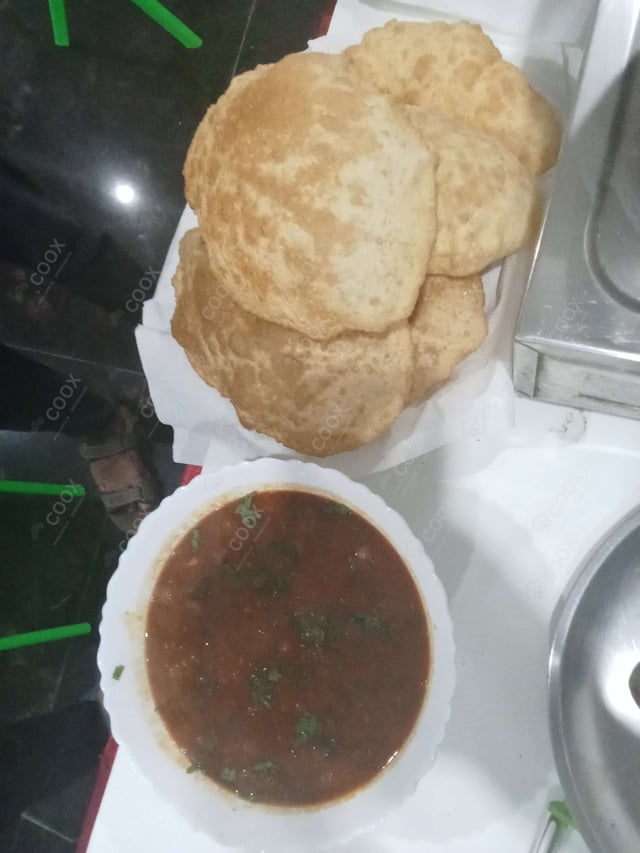 Delicious Chana Bhatura prepared by COOX