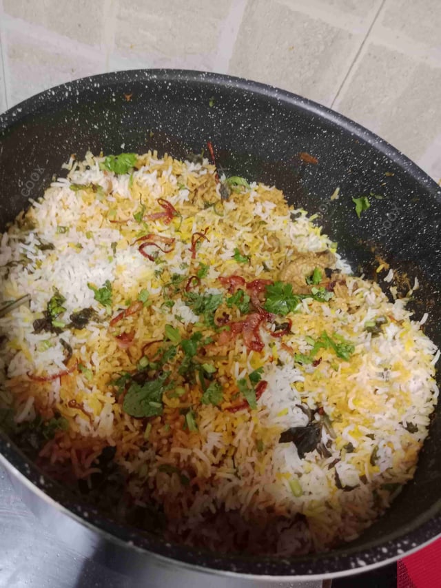 Delicious Chicken Biryani prepared by COOX