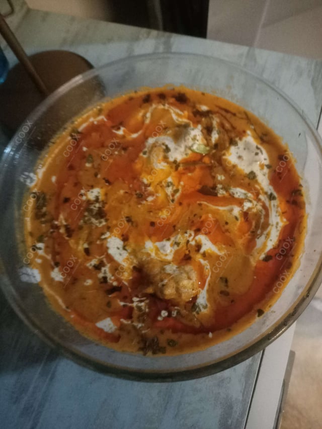 Delicious Butter Chicken prepared by COOX